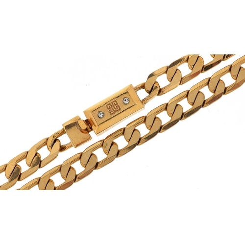 2394 - A Givenchy gold plated curb link necklace, 74cm in length, 31.8g.