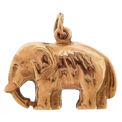 2196 - A 9ct gold charm in the form of an elephant, 1.6cm wide, 0.8g.