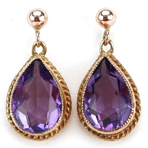 2345 - A pair of yellow metal amethyst teardrop earrings, 1.8cm high, total weight 2.4g.