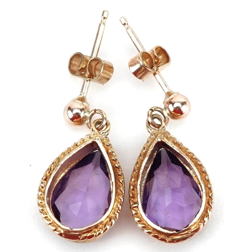 2345 - A pair of yellow metal amethyst teardrop earrings, 1.8cm high, total weight 2.4g.