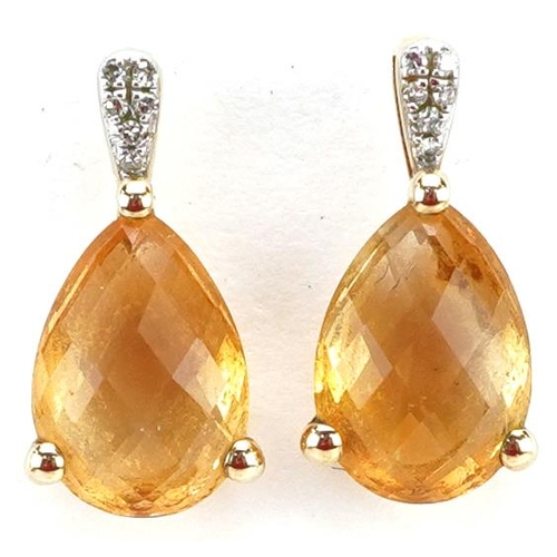 2382 - A pair of 9ct gold citrine and diamond teardrop earrings, 1.5cm high, total weight 2.0g.