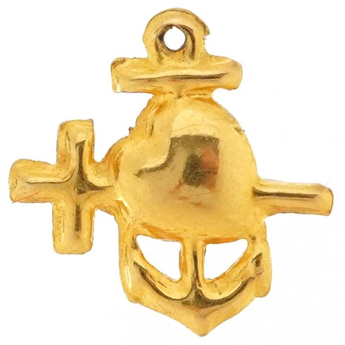 2506 - A 9ct gold pendant in the form of a heart and anchor crossing, 1cm high, 0.4g.