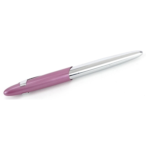 157 - A Louis Codan ballpoint pen finished in pink and chrome, 14cm in length, boxed.