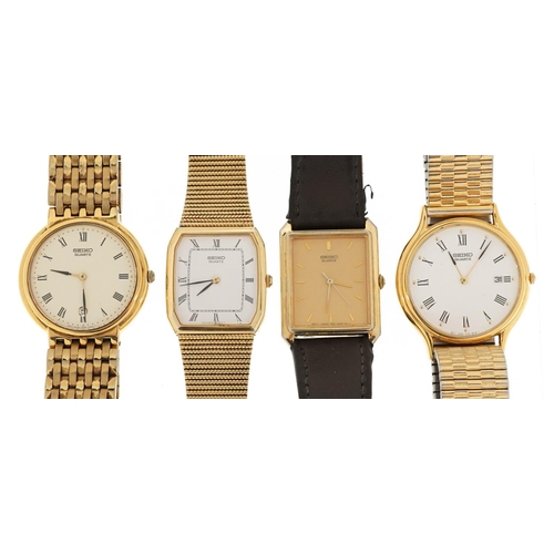 2566 - Four Seiko gentlemen's quartz dress watches.