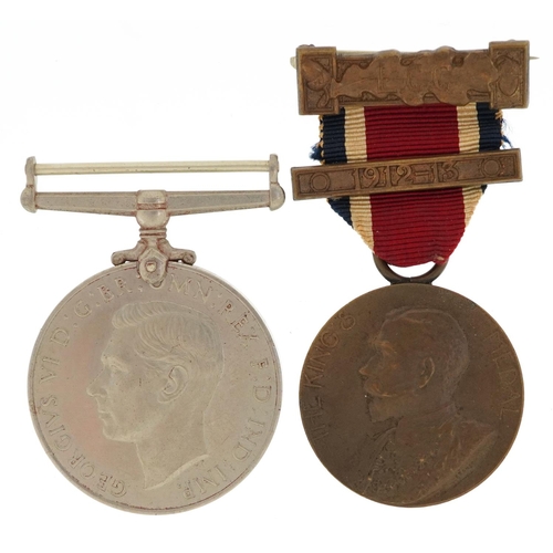 691 - A British military World War II Defence medal and King's medal awarded to A Norris.