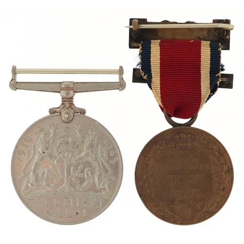 691 - A British military World War II Defence medal and King's medal awarded to A Norris.