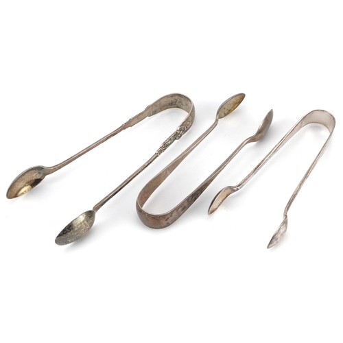 282 - Three pairs of Edwardian and later silver sugar tongs including a pair embossed with an apostle, the... 