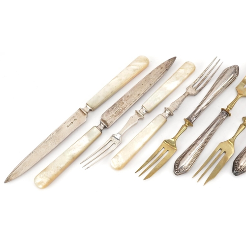 361 - A pair of Mappin & Webb silver and mother of pearl knives and forks together with a set of six silve... 