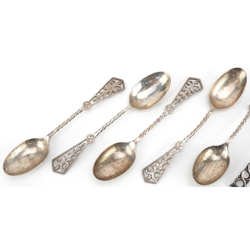 199 - Seven silver teaspoons including a pair with shell shaped bowls, 11.5cm in length, total 81.8g.