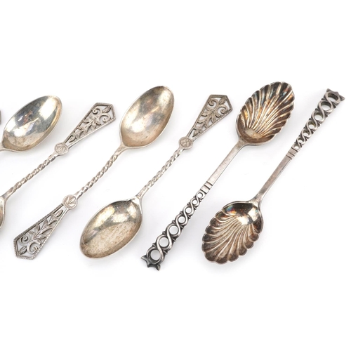 199 - Seven silver teaspoons including a pair with shell shaped bowls, 11.5cm in length, total 81.8g.