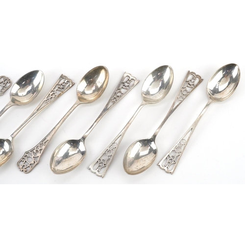 358 - Nine silver teaspoons with APGC pierced terminals, Sheffield hallmarks, 11cm in length, total 102.5g... 