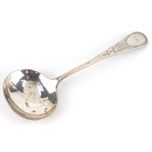 195 - Martin, Hall & Co., a Victorian silver caddy spoon with engraved decoration, Sheffield 1875, 11.5cm ... 