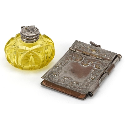 281 - A Victorian uranium glass scent bottle with unassociated silver lid and a silver plated aide-memoire... 