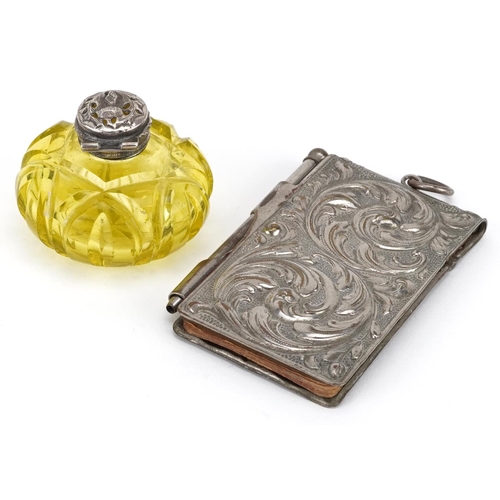 281 - A Victorian uranium glass scent bottle with unassociated silver lid and a silver plated aide-memoire... 