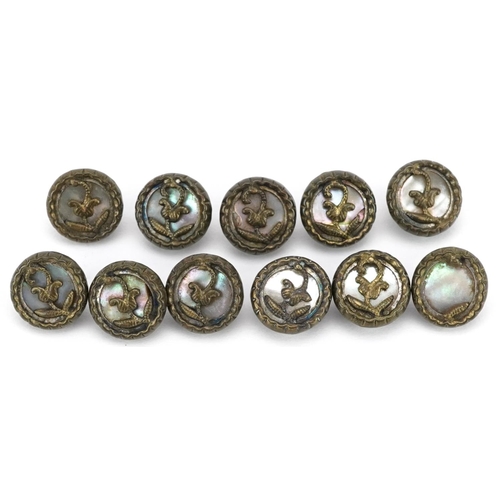 213 - A set of eleven vintage gilt metal and mother of pearl buttons, 10mm in diameter.