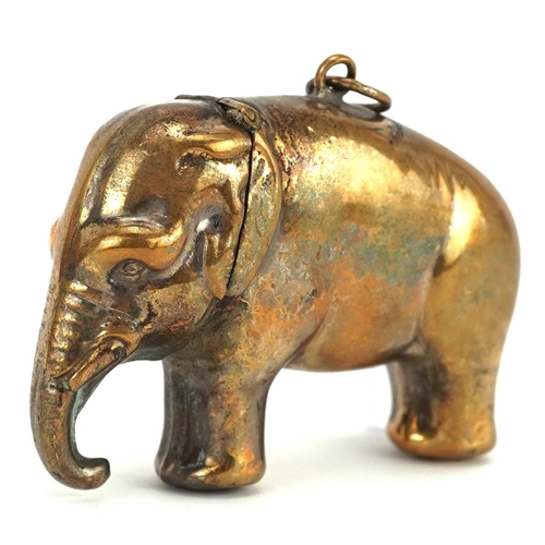 294 - A vintage novelty brass vesta in the form of an elephant, 5.5cm in length.