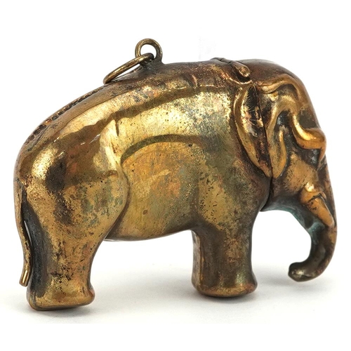 294 - A vintage novelty brass vesta in the form of an elephant, 5.5cm in length.