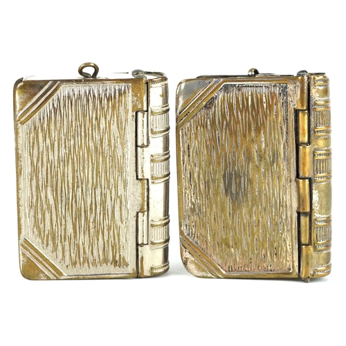 298 - Two vintage silver plated vesta/stamp cases, one with Isle of Man logo, each 4.8cm high.