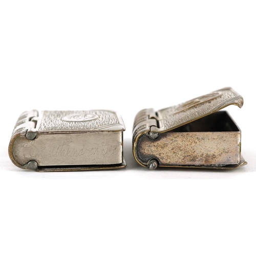 298 - Two vintage silver plated vesta/stamp cases, one with Isle of Man logo, each 4.8cm high.