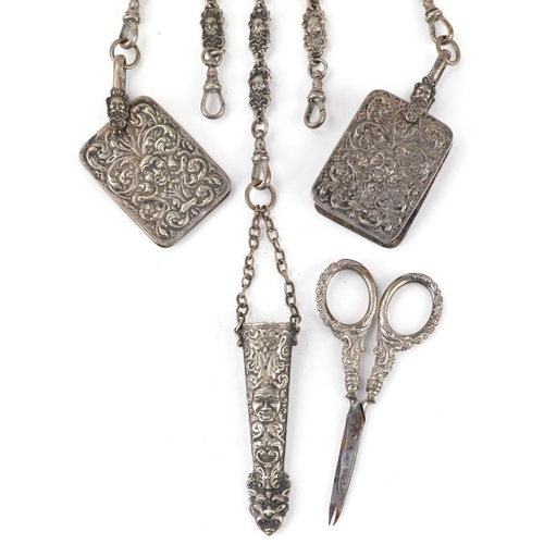 289A - A Victorian silver plated chatelaine with aide-memoire and silver scissors, embossed with The Green ... 