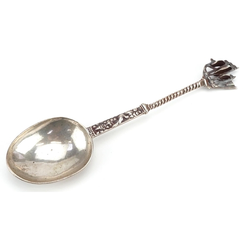 235 - An antique unmarked silver spoon with rigged ship design terminal, 18cm in length, 55.0g.