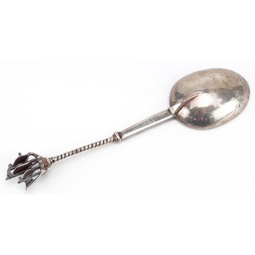 235 - An antique unmarked silver spoon with rigged ship design terminal, 18cm in length, 55.0g.