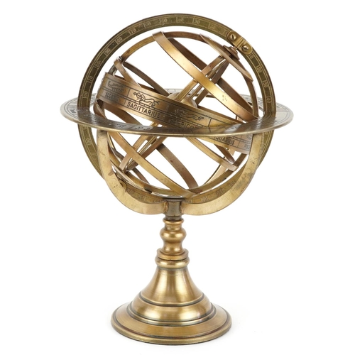 1365 - A gilt metal zodiac desk globe, 26.5cm high.