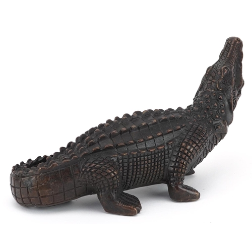 377 - A patinated bronze study of a crocodile, 23.5cm in length.