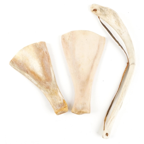 1185 - A group of three Canadian Inuit caribou antler items, two from the Clyde River and the other from th... 