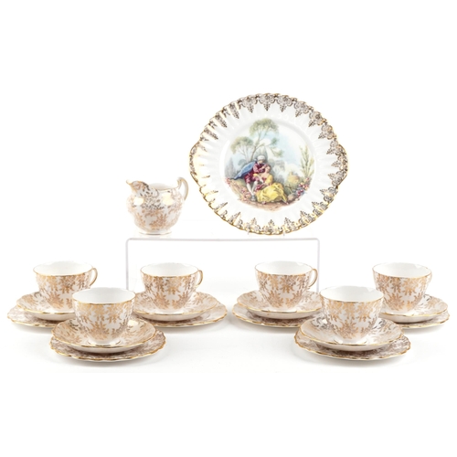 437 - A Royal Vale bone china part tea service with gilded decoration together with a similar hand painted... 