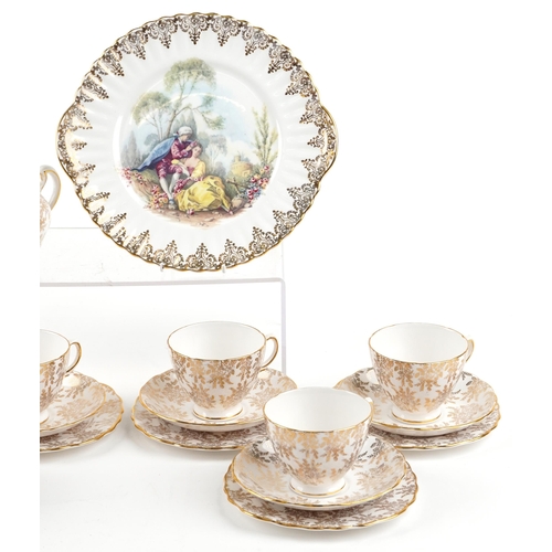 437 - A Royal Vale bone china part tea service with gilded decoration together with a similar hand painted... 