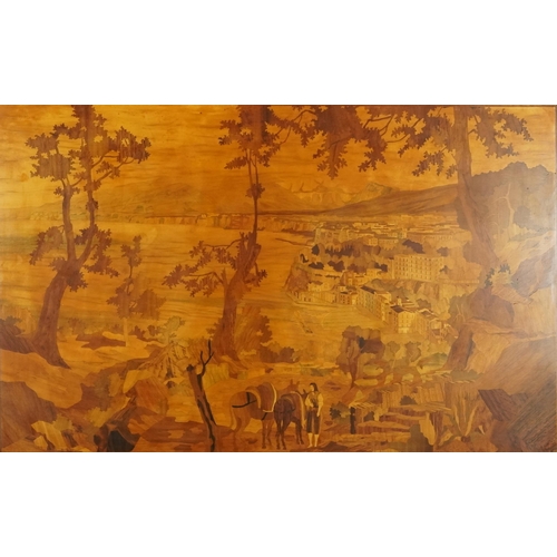 Gianni Paturzo - A mid 20th century Italian Sorrento inlaid panel, coastal landscape view, inlaid with various wood specimens, bearing label verso, signed and numbered 56, 70cm x 105cm.