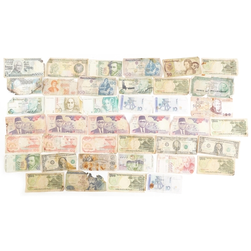 1510 - Vintage world banknotes to include Germany, Indonesia, Spain and an American twenty dollar reserve n... 