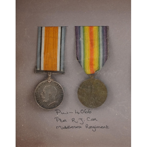 660 - Five British military World War I medals including two pairs awarded to PW.4066 PTE.R.J.COX.MIDD'X R... 