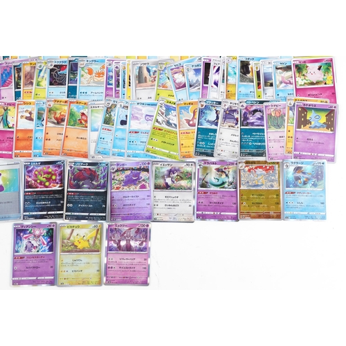 532 - A large collection of 2023 Japanese Pokémon trade cards, some holographic, approximately two hundred... 