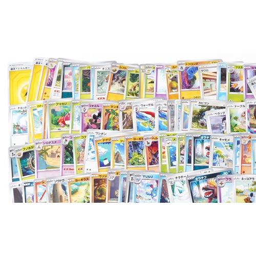 531 - A large collection of 2023 Japanese Pokémon trade cards, some holographic, approximately two hundred... 