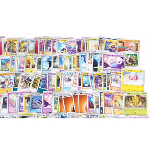 531 - A large collection of 2023 Japanese Pokémon trade cards, some holographic, approximately two hundred... 