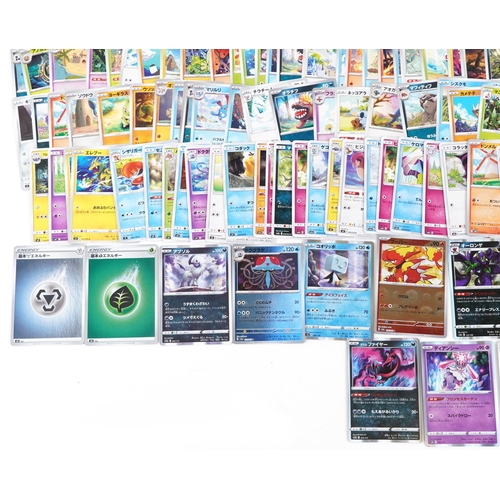 531 - A large collection of 2023 Japanese Pokémon trade cards, some holographic, approximately two hundred... 