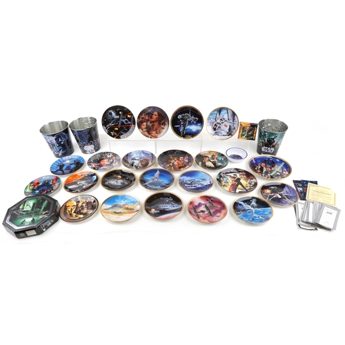 584 - A collection of Star Wars collector's plates together with three tin buckets.