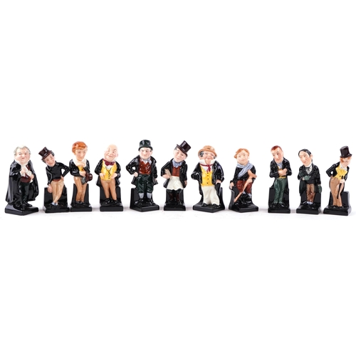 410 - A group of eleven Royal Doulton bone china figures including David Copperfield, Captain Cuttle and T... 