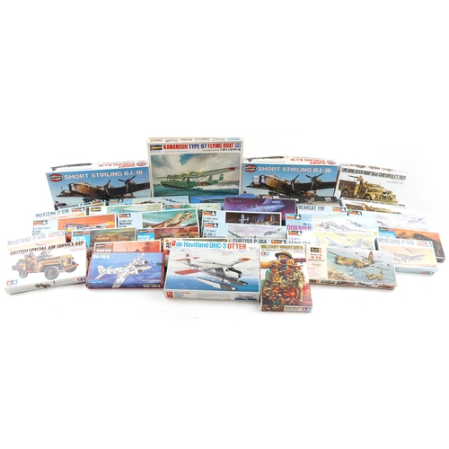 558 - A collection of collector's model kits including Monogram, Hasegawa, Tamiya, Revell and Airfix.