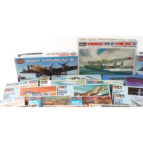 558 - A collection of collector's model kits including Monogram, Hasegawa, Tamiya, Revell and Airfix.