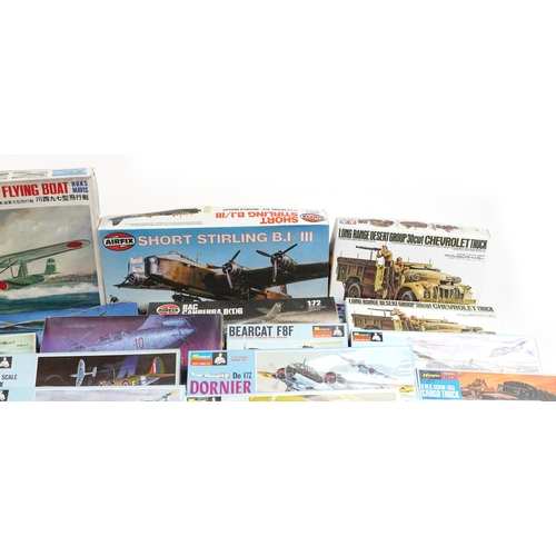 558 - A collection of collector's model kits including Monogram, Hasegawa, Tamiya, Revell and Airfix.