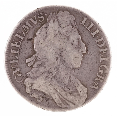 A William III 1700 silver crown with script to the edge ending in tertio, 38.6mm in diameter.