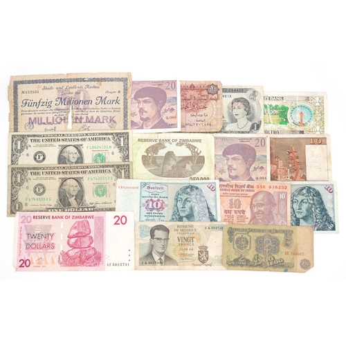 1512 - Vintage world banknotes including fifty million marks dated 1923, two USA one dollar notes and Zimba... 