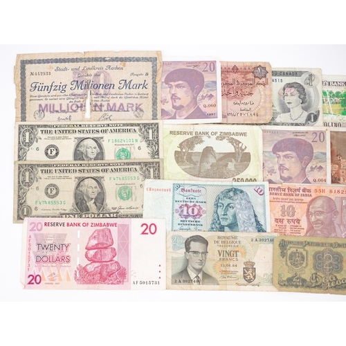 1512 - Vintage world banknotes including fifty million marks dated 1923, two USA one dollar notes and Zimba... 