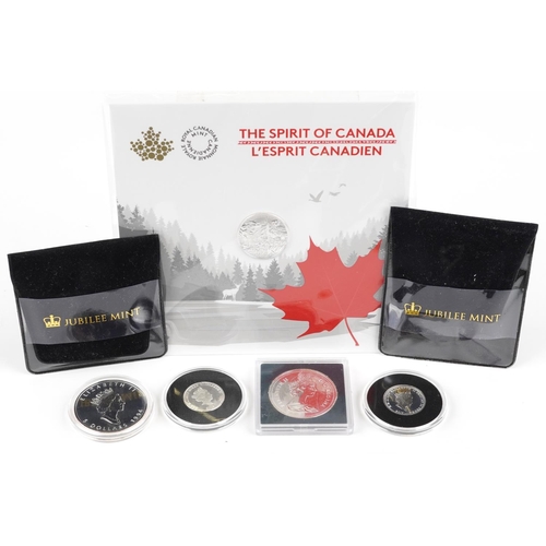 1499 - Five silver coins to include proof examples including Canada 1994 one ounce fine silver five dollars... 