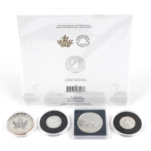 1499 - Five silver coins to include proof examples including Canada 1994 one ounce fine silver five dollars... 