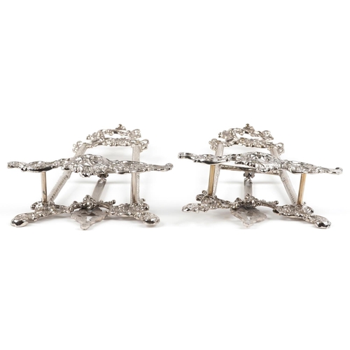 1276 - A pair of Rococo style brass easel stands, each 41cm high.