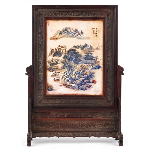 380 - A Chinese hand painted porcelain panel housed in a hardwood frame, 60cm x 43cm.